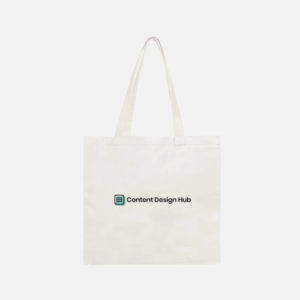 White tote bag with the Content Design Hub logo